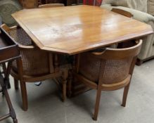 A 20th century oak pedestal dining table of square form,