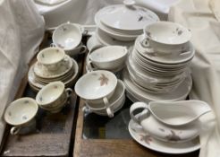 A Royal Doulton Tumbling leaves pattern part dinner service together with a floral decorated part