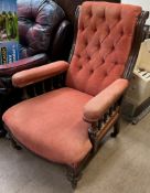 A Victorian library chair, with button back upholstery,