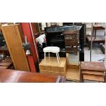 A 20th century oak wardrobe and matching dressing table together with a nest of three teak tables