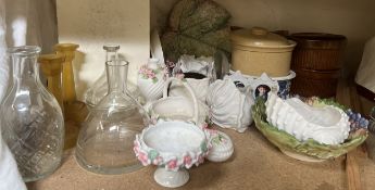 Pottery casserole dishes together with pottery shell vases, decanters,