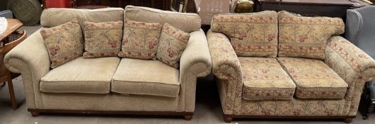 An upholstered two seater settee with pictorial upholstery together with an oatmeal coloured settee