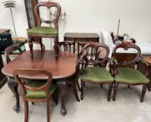 An early 20th century mahogany dining table together with a set of six Victorian style mahogany