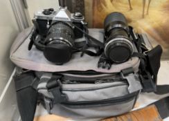 A Pentax ME Super camera and lenses etc