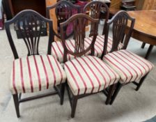 A set of three George III mahogany dining chairs together with two other dining chairs ***TO BE