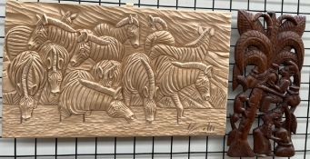 A Mikuz A carved panel of Zebra Signed Together with an African carving of figures and a tree