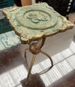 A brass side table of square form with a cast dragon and fish on a copper ball column and three