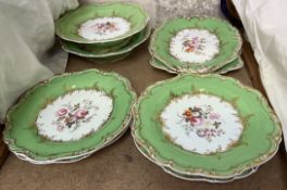 A 19th century English part dessert service painted with flowers to an apple green border