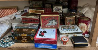 A collection of tins including Riley's Toffee,