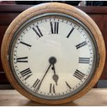 A 19th century oak framed Railway type timepiece wall clock of circular form with Roman numerals