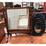 A 19th century mahogany toilet mirror together with a Chinese carved wall mirror