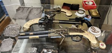 Replica flintlock pistols together with purses,