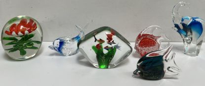 An aquarium paperweight together with a collection of paperweights