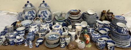 A pair of blue and white lidded vases together with a quantity of blue and white pottery part tea