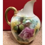 A Royal Worcester flat back jug, decorated with pink and yellow roses,