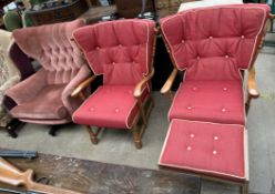 A mid 20th century egg type chair together with two mid 20th century elbow chairs and a foot stool