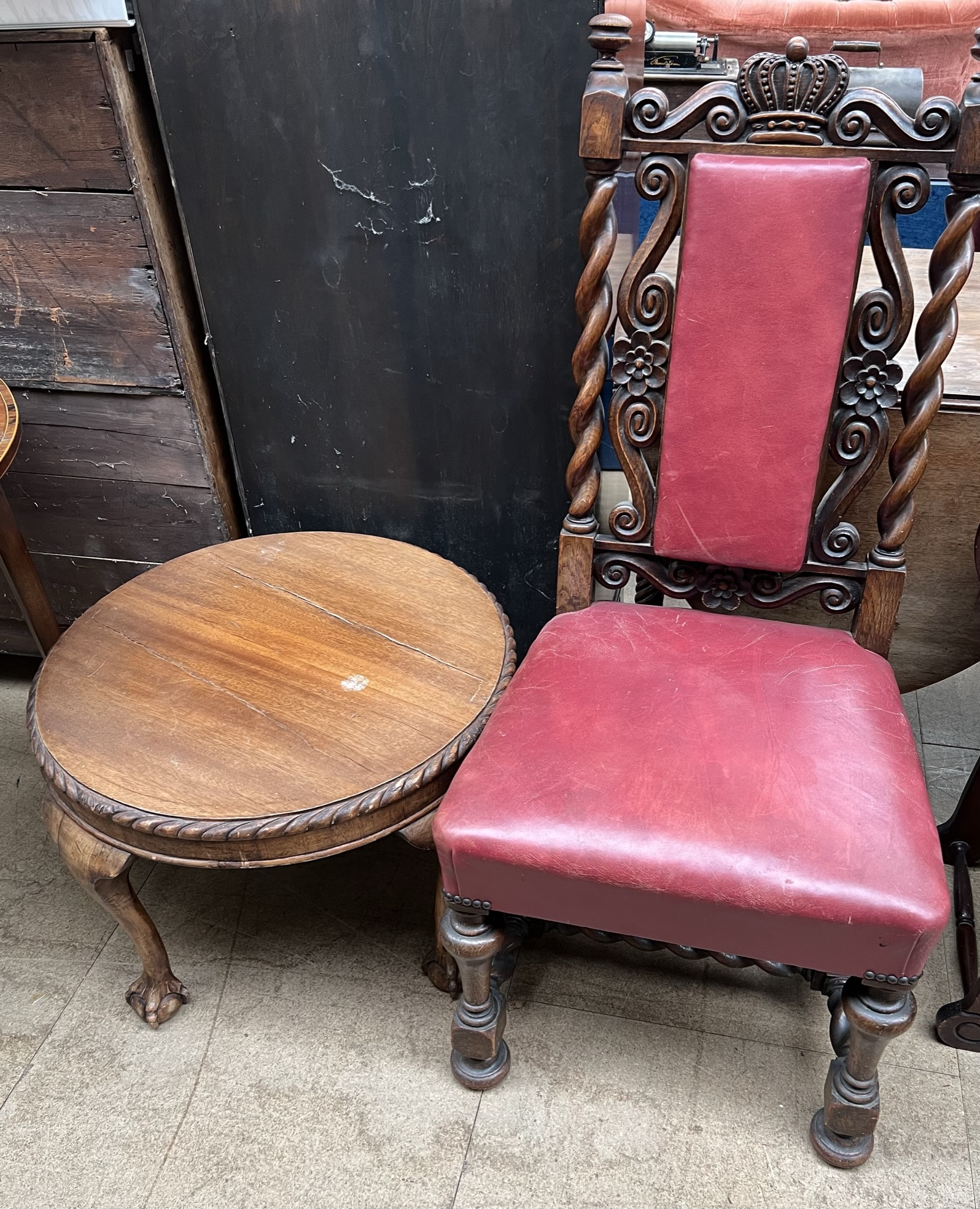 A 17th century style dining chair with crown carved cresting rail,