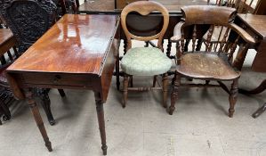 A Victorian mahogany pembroke table together with a smokers bow elbow chair and a Victorian balloon