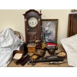 A truncheon together with a print, wall clock, coffee grinder,