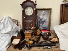 A truncheon together with a print, wall clock, coffee grinder,