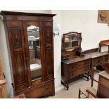 A 20th century oak three piece bedroom suite comprising a single door wardrobe,