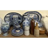A quantity of blue and white pottery including meat plates,