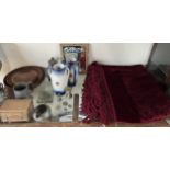 A red tasselled table cover together with a pair of pottery vases, Cadbury mirror, treen bowls,