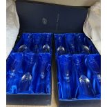 Two boxes of Bohemian crystal champagne flutes