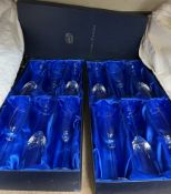 Two boxes of Bohemian crystal champagne flutes