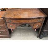 A 19th century mahogany sideboard with a D shaped top above three drawers on square tapering legs,