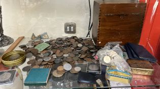 A collection of pre 1920 and later coins in a hinged box, including pennies,