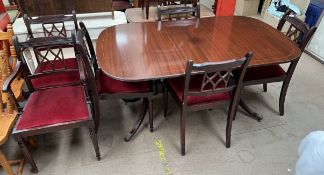 A reproduction mahogany extending dining table and six chairs ***PLEASE NOTE THAT THIS LOT WILL BE