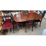 A reproduction mahogany extending dining table and six chairs ***PLEASE NOTE THAT THIS LOT WILL BE