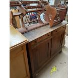 A continental pine side cabinet with a rectangular top and two drawers and two cupboards together