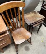 A 19th century slat back rocking chair together with a nest of three tables