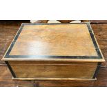 A table top box of rectangular form with brass drop handles
