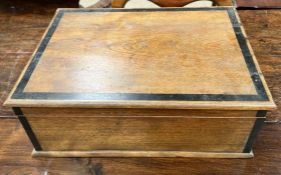 A table top box of rectangular form with brass drop handles