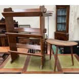 A mid 20th century teak bookcase together with a teak pebble occasional table
