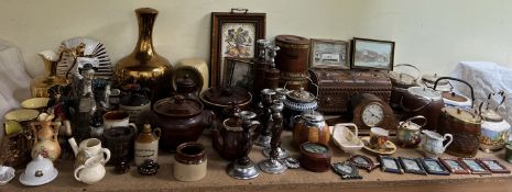 Oak candlesticks together with stoneware bottles, casserole dishes, biscuit barrels, copper lustre,