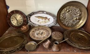 Brass plaques together with copper pans,