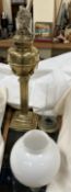 A Victorian Brass oil lamp with a square reeded column and square sloped base ***TO BE RE-OFFERED