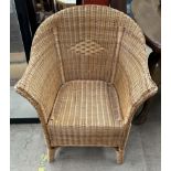 A loom elbow chair with flared arms