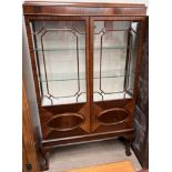 A 20th century mahogany display cabinet,