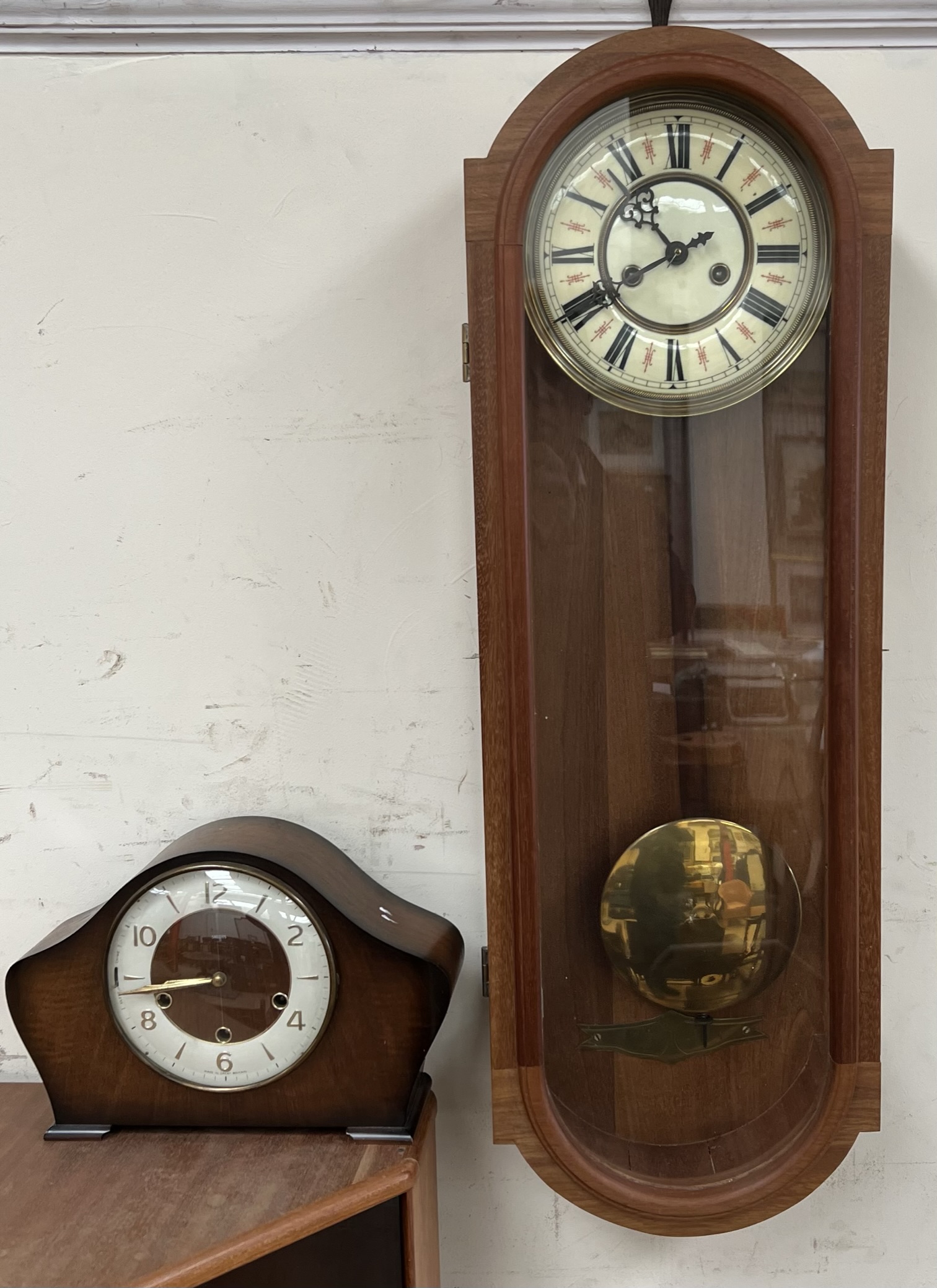 A mahogany wall clock with a circular dial and Arabic numerals together with Smiths mantle clock