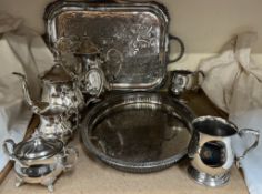 An electroplated four piece teaset together with electroplated trays and tankards