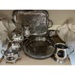 An electroplated four piece teaset together with electroplated trays and tankards