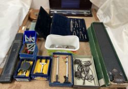 A draughtsman set, together with a slide ruler, tape measure, Hornby signals,