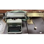 An Imperial 66 typewriter together with a brass desk lamp