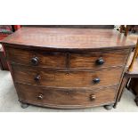 A 19th century mahogany chest with two short and two long drawers on turned legs