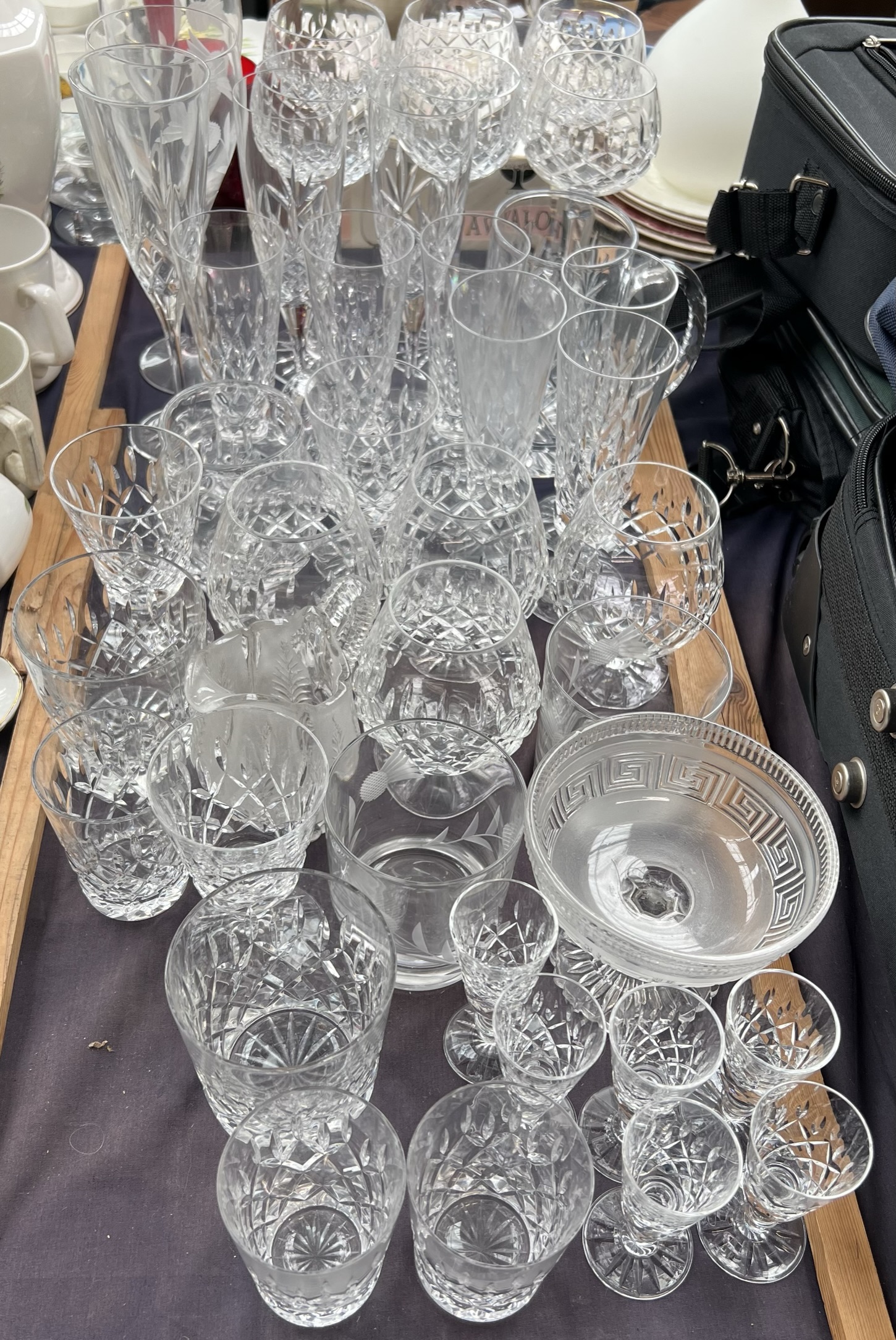 A set of six cut glass wine glasses together with other cut glass drinking glasses